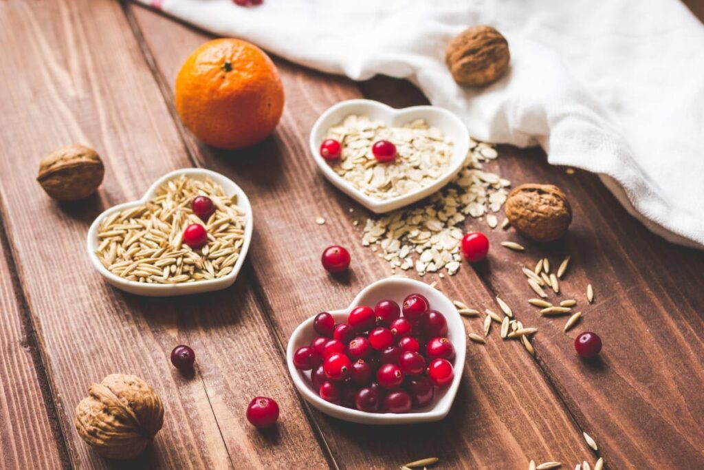 A variety of frutis and grains on a table.